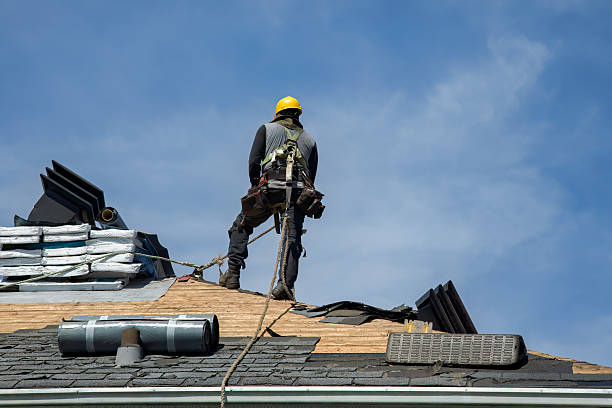 Professional Roof Replacement technician working in North Springfield, VT